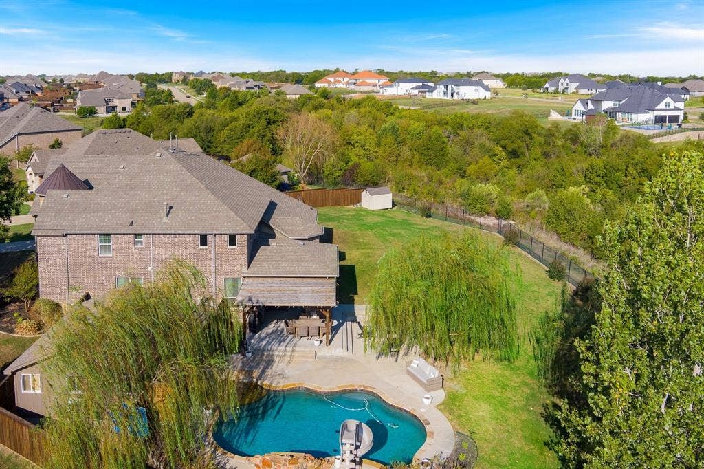 Large lot backing up to a tree lined greenbelt.  Privacy and tranquility.