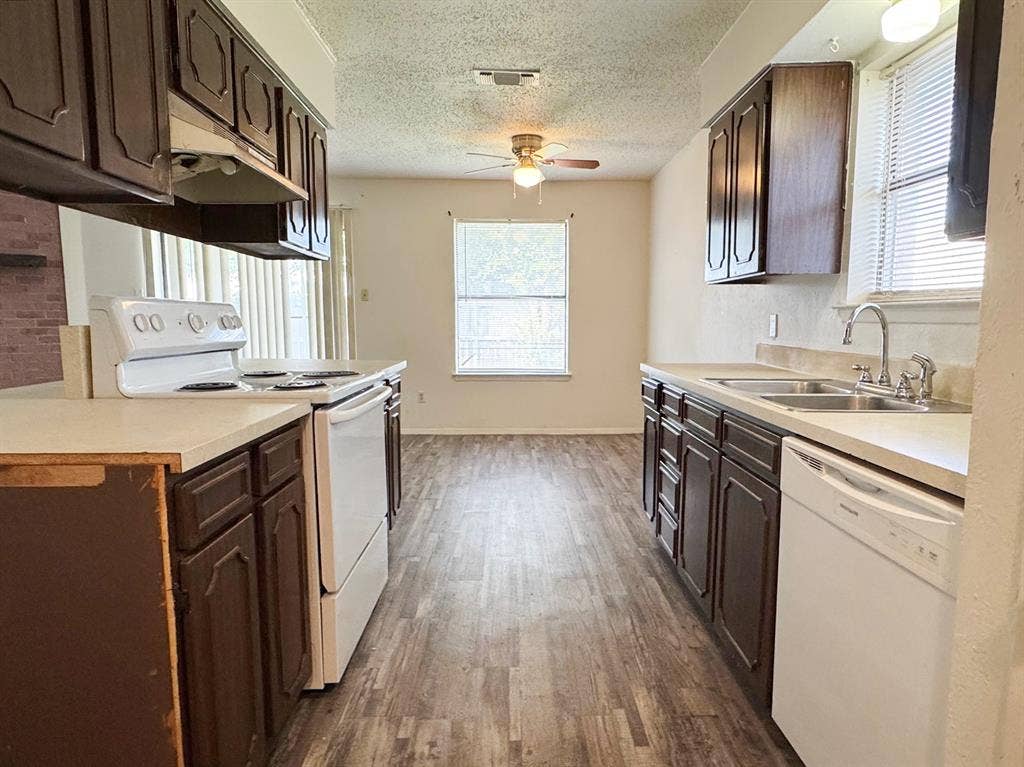 2333 Chandelle Drive, Irving, TX 75060 View of kitchen from laundry room and garage