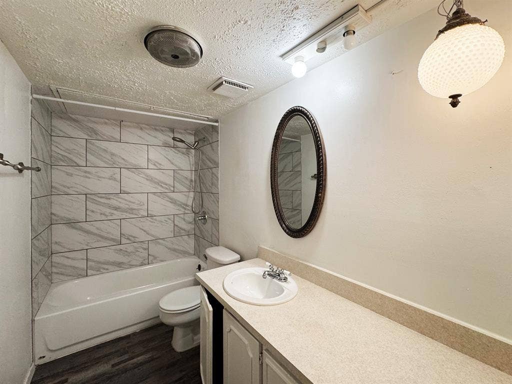 2333 Chandelle Drive, Irving, TX 75060 Hall bathroom showcasing shower