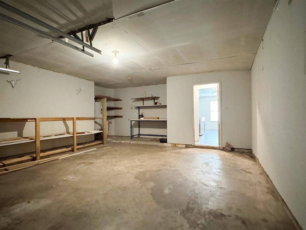 2333 Chandelle Drive, Irving, TX 75060 Garage looking into laundry room and kitchen