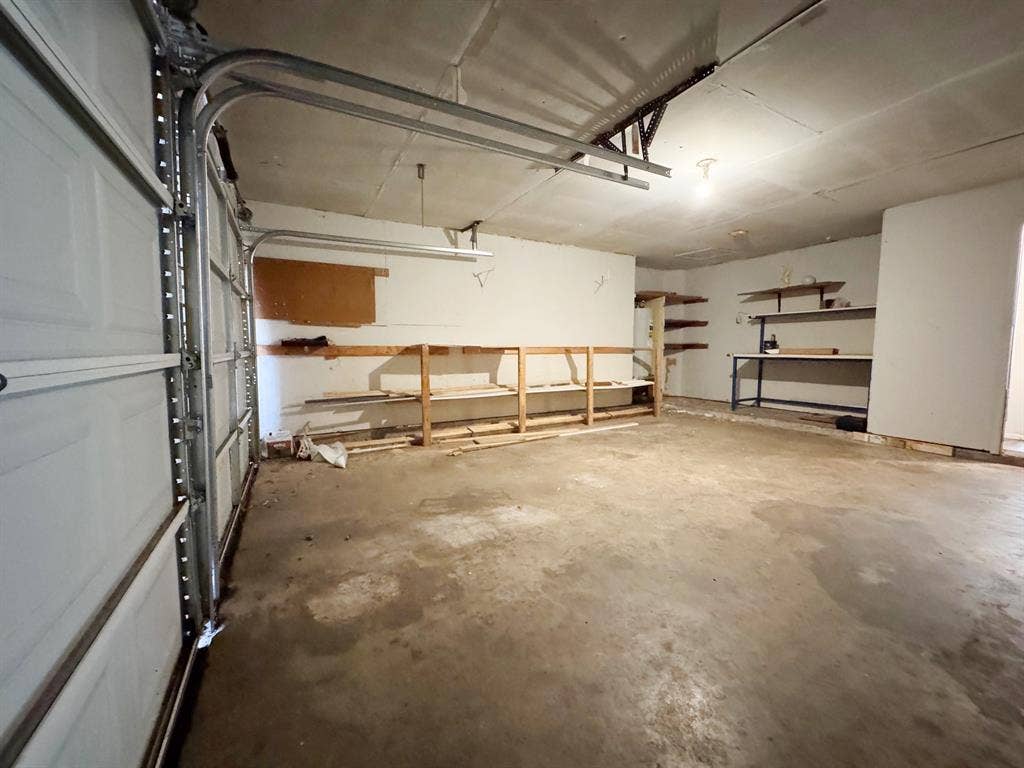 2333 Chandelle Drive, Irving, TX 75060 Garage showing work bench and storage area