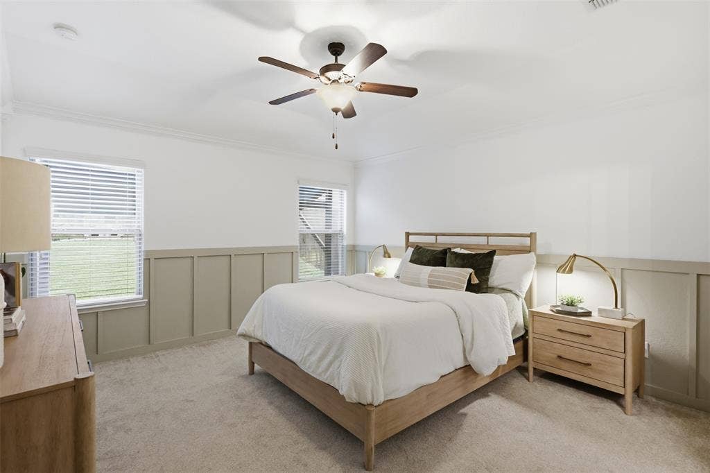 Primary bedroom updates include custom board and batten walls with designer color scheme