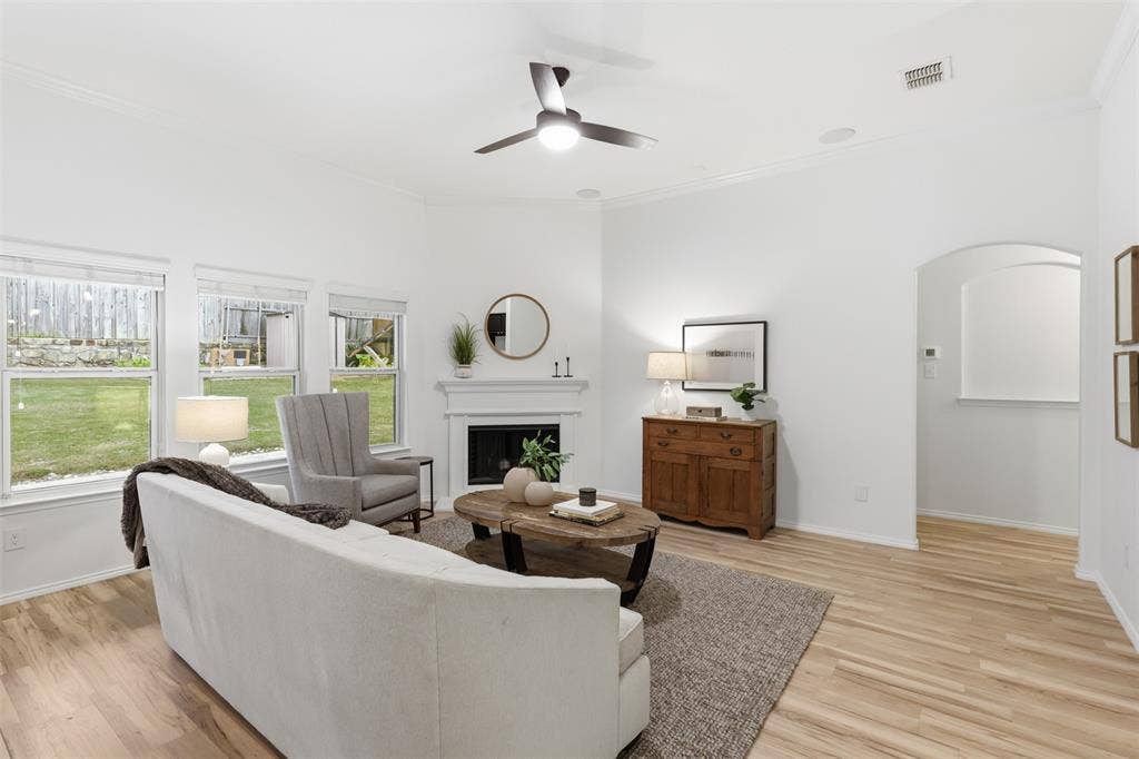 Newly installed flooring creates a beautiful seamless feel throughout the downstairs area.