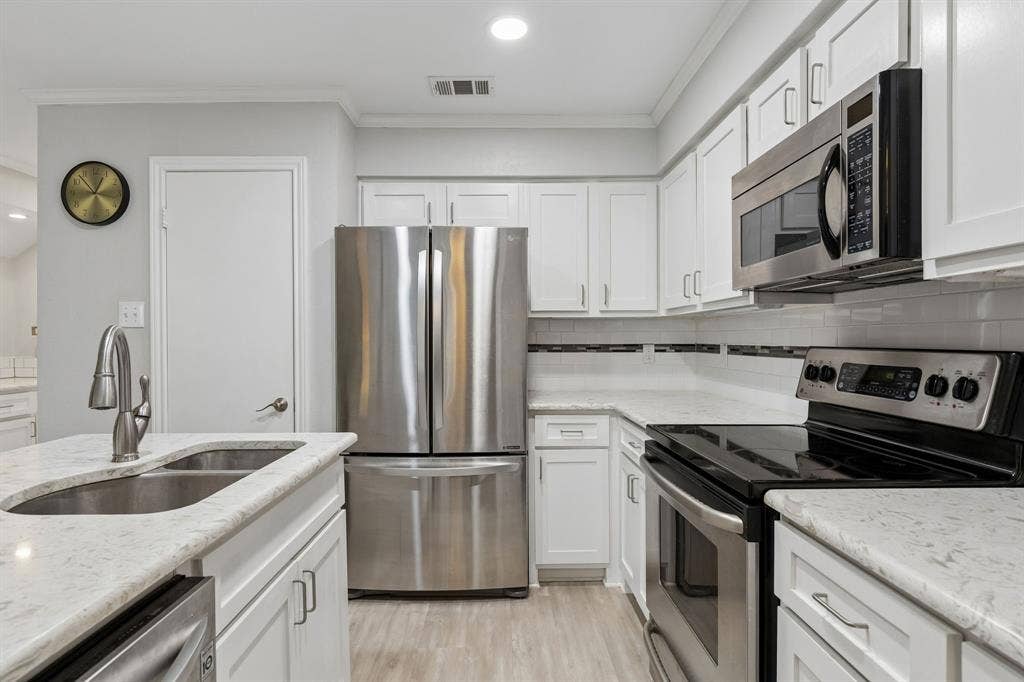 2103 Country Villa Drive, Carrollton, TX 75006 Leads to large, private deck.