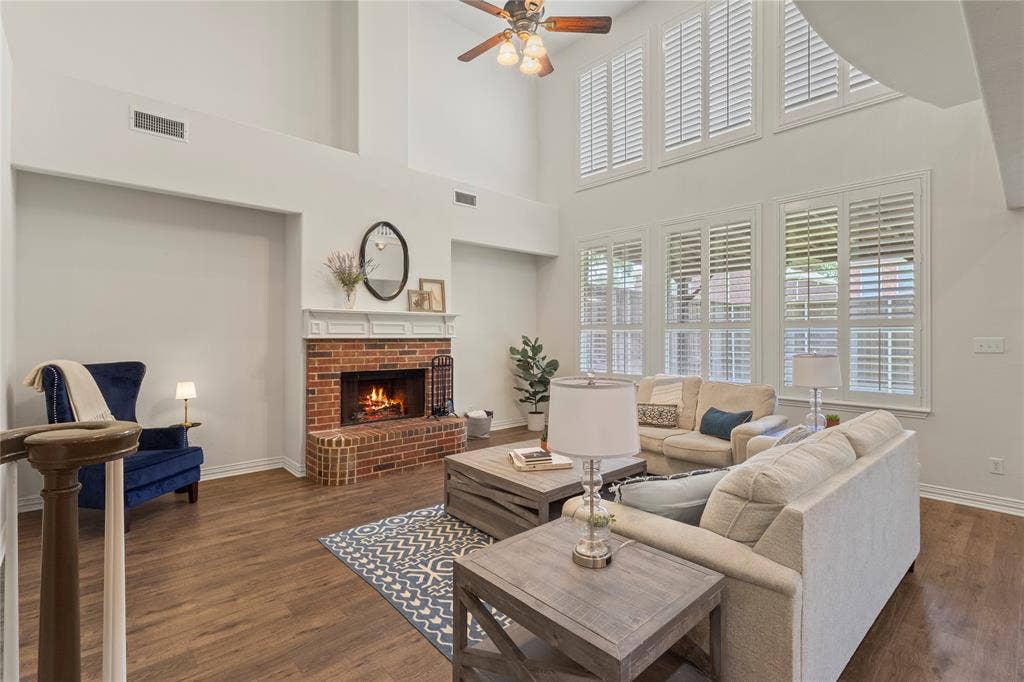 Soaring ceilings, Plantation shutters, wood burning fireplace