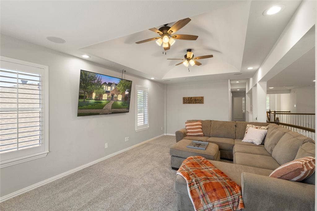Second floor game room overlooks living room