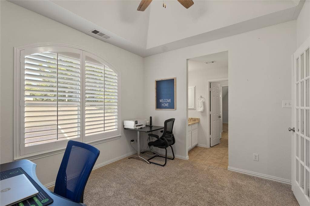 Second floor bedroom features french doors. Currently office, with access to Jack and Jill bath
