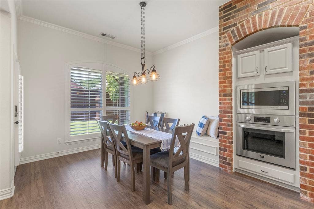 Brick accent wall, overlooks backyard