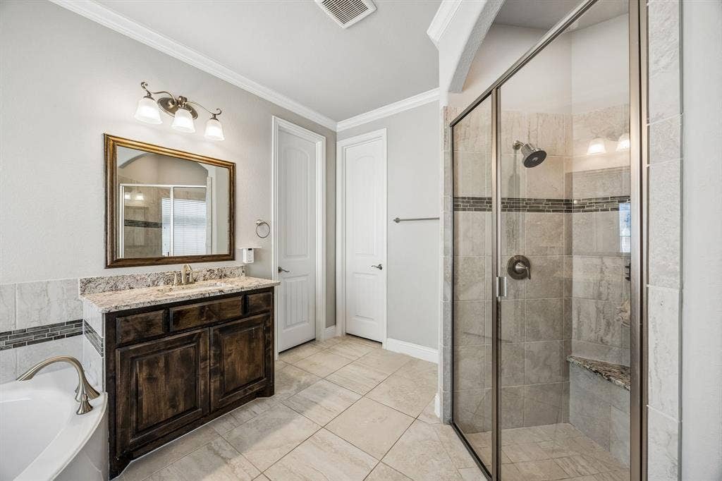 2816 Driftwood Creek Trail, Celina, TX 75078 Dual vanities with tub and separate shower.