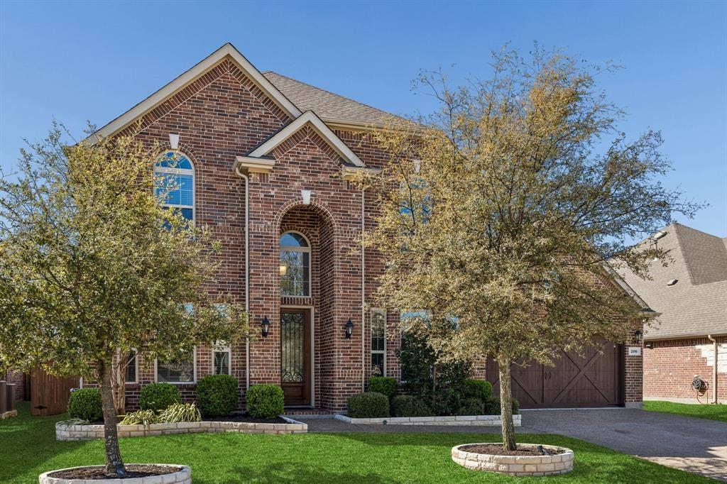 2816 Driftwood Creek Trail, Celina, TX 75078 North facing home with front entry garage.