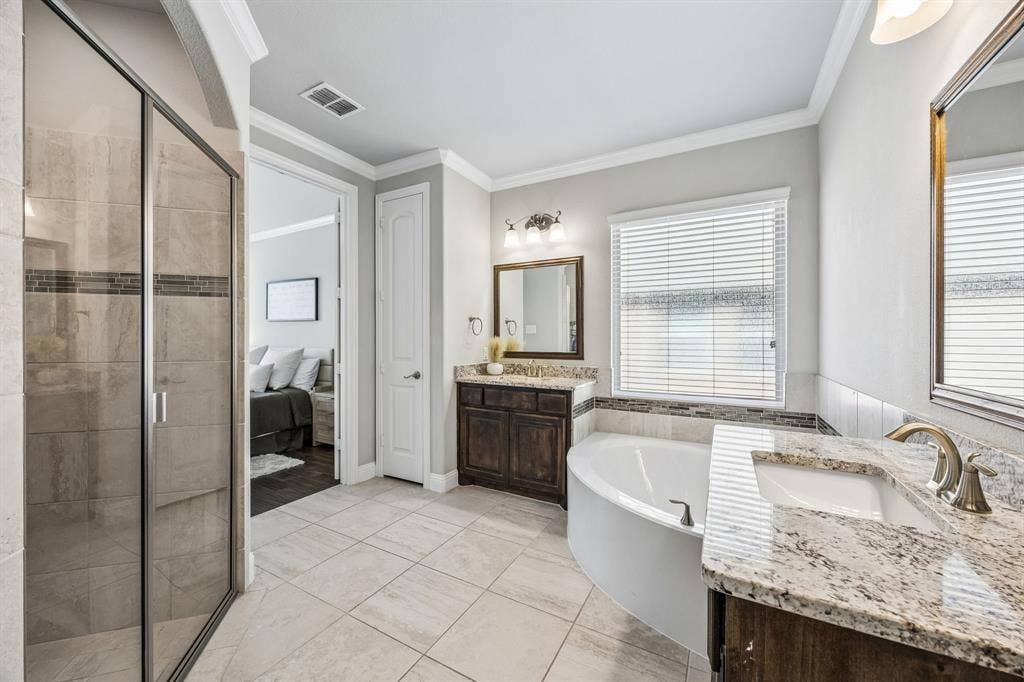 2816 Driftwood Creek Trail, Celina, TX 75078 Dual vanities with tub and separate shower.