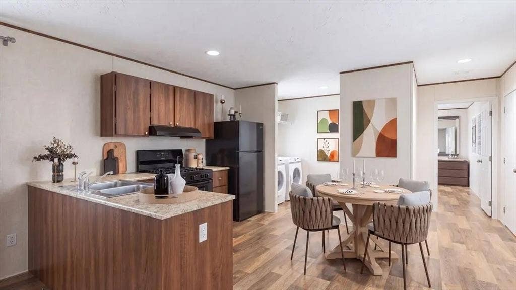 222 W Acres Road, Gun Barrel City, TX 75156 Kitchen featuring wood-finish cabinetry, stone-texture laminate countertops, dual-basin stainless steel sink, wood-finish flooring, and recessed lighting