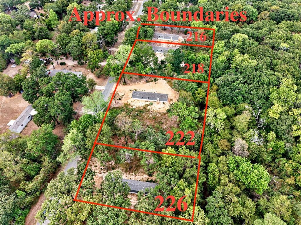 222 W Acres Road, Gun Barrel City, TX 75156 Aerial view of four residential parcels featuring significant tree coverage and natural landscaping