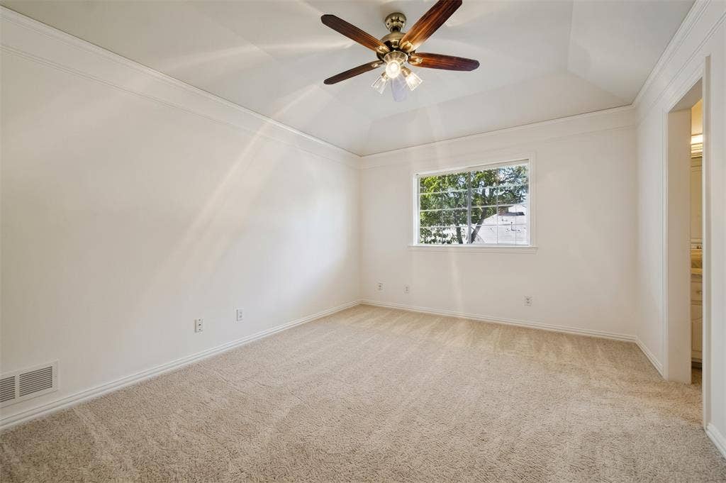 One of two second floor bedrooms