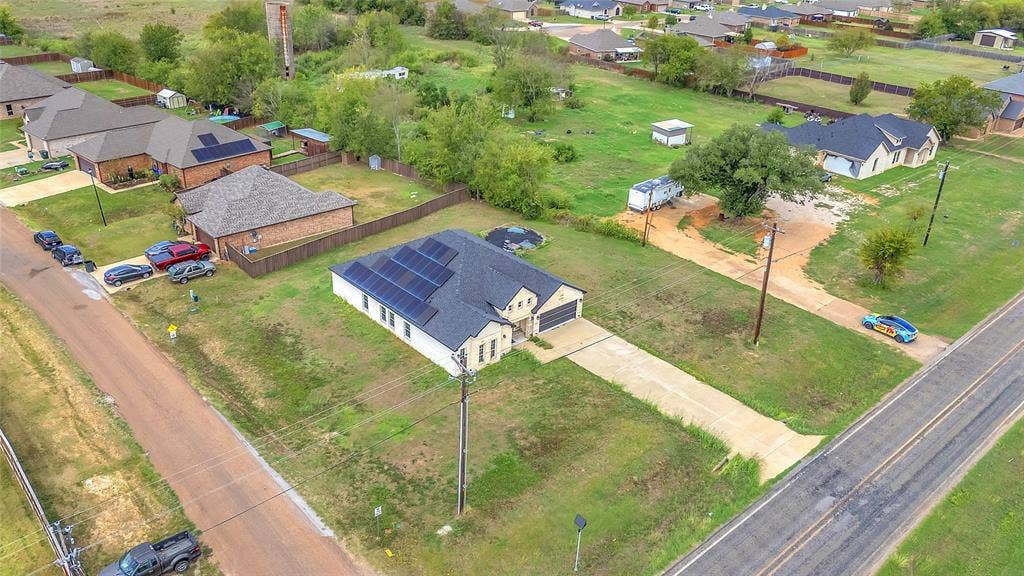 2002 Clay Street, Mabank, TX 75147 Aerial view showing the lot, long driveway and surrounding Mabank neighborhood