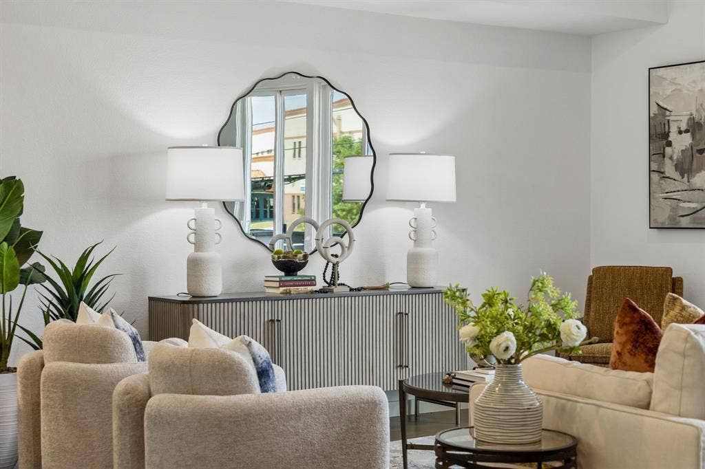 1901 N Carroll Avenue, #104, Dallas, TX 75204 Neutral-toned interior featuring hard-surface flooring and crisp white walls