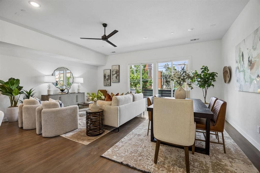 1901 N Carroll Avenue, #104, Dallas, TX 75204 Open-concept interior featuring wood-finish flooring, recessed lighting, a modern ceiling fan, and sliding glass doors