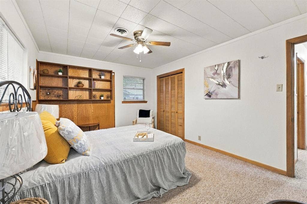 Built in cabinets, natural light with access to ensuite.