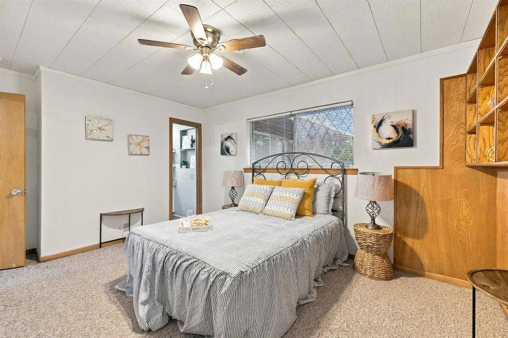 Built in cabinets, natural light with access to ensuite.
