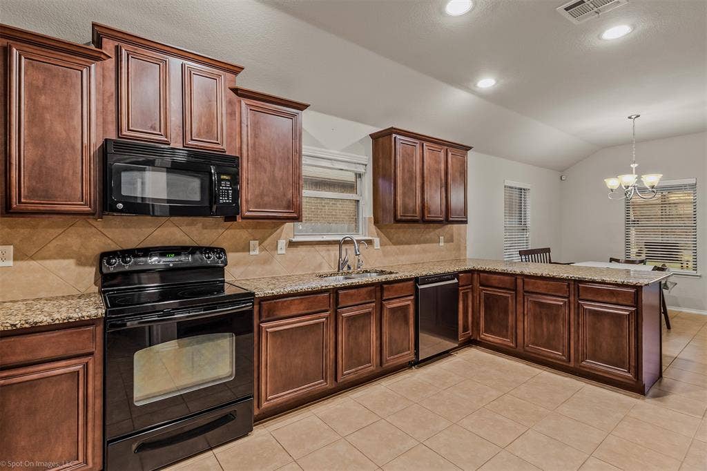 2018 Sterling Gate Drive, Heartland, TX 75126 Granite Countertops, tall cabinets