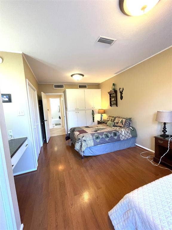 4924 Cobbs Drive, #1H, Waco, TX 76710 Bedroom with wall of cabinents