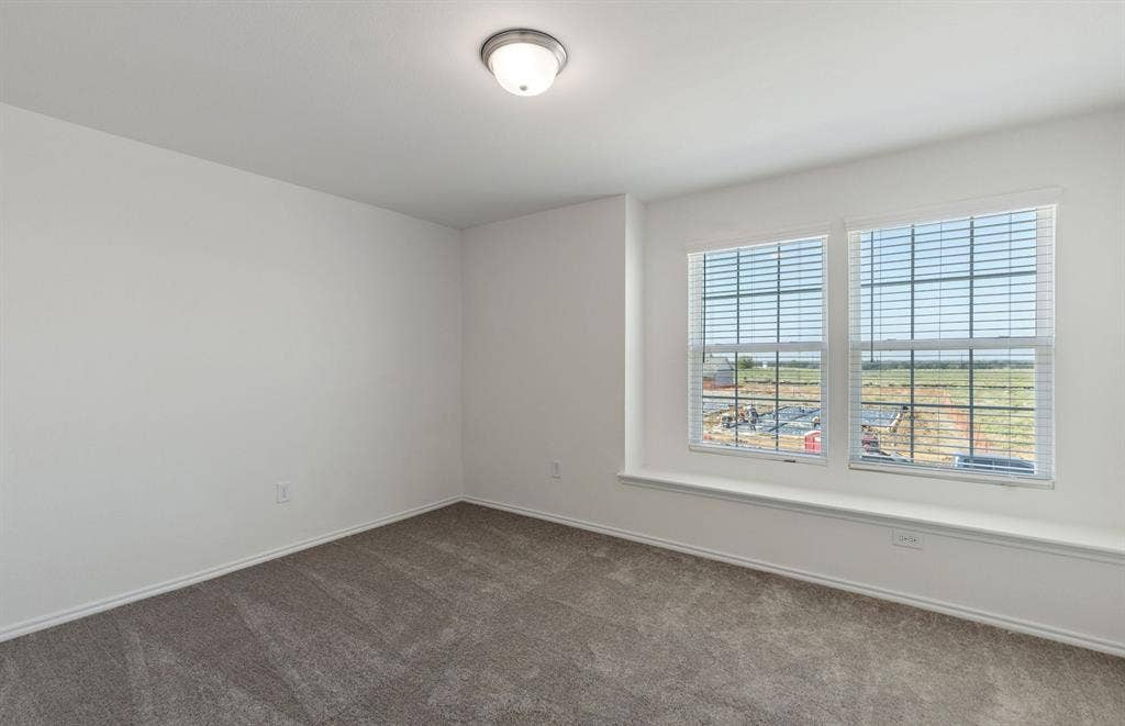 1215 Briar Street, Princeton, TX 75407 *Floorplan representation, not actual home - Spacious secondary bedroom with large windows