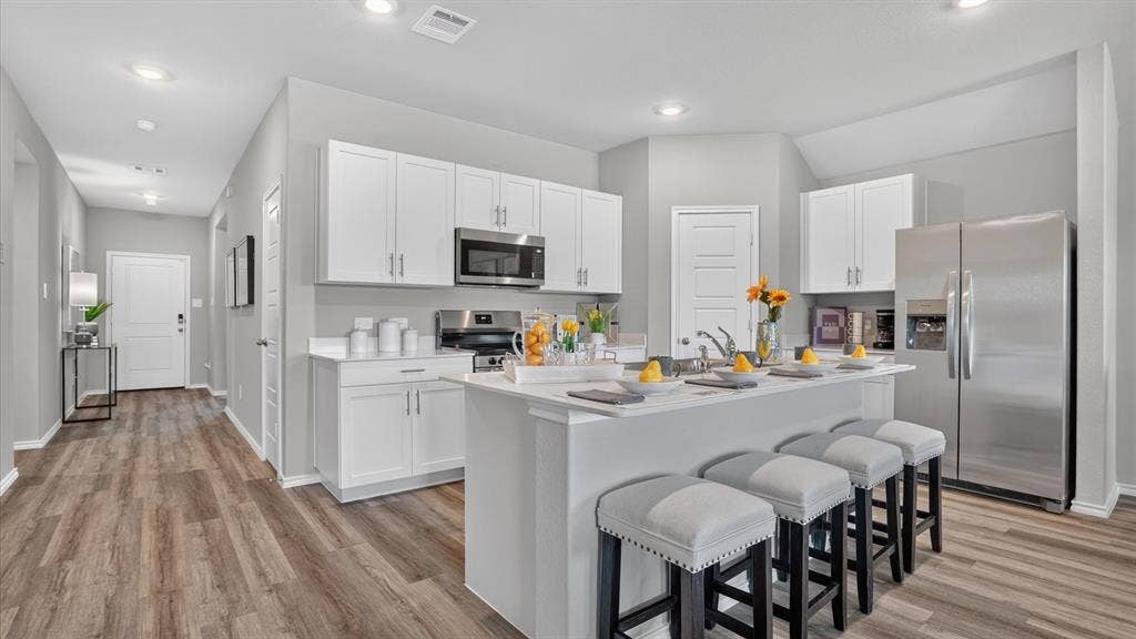 Kitchen - All Home and community information, including pricing, included features, terms, availability and amenities, are subject to change at any time without notice or obligation. All Drawings, pictures, photographs, video, square footages, floor plans, elevations, features, colors and sizes are approximate for illustration purposes only and will vary from the homes as built.