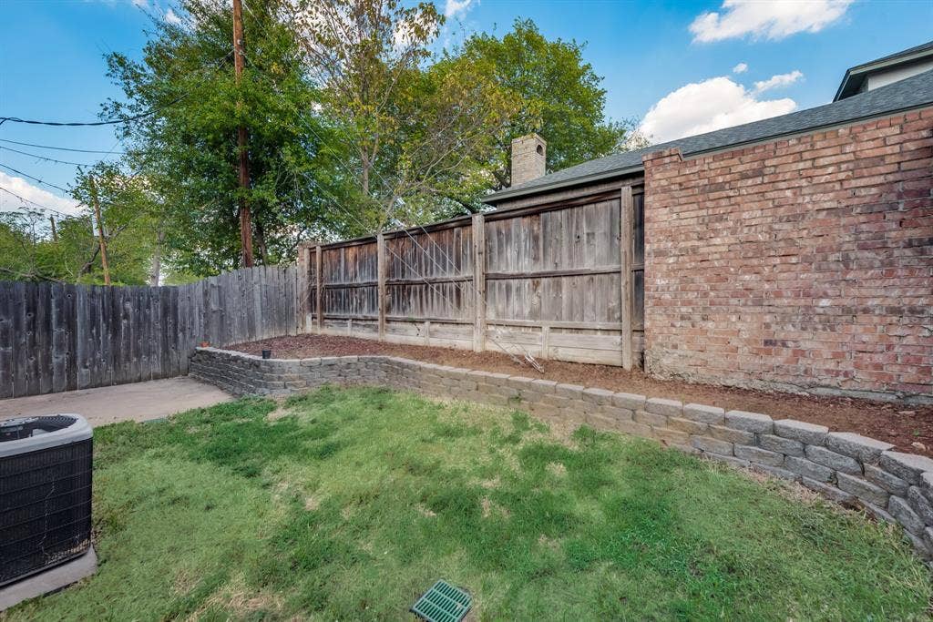 back yard with elevated flower / plant bed