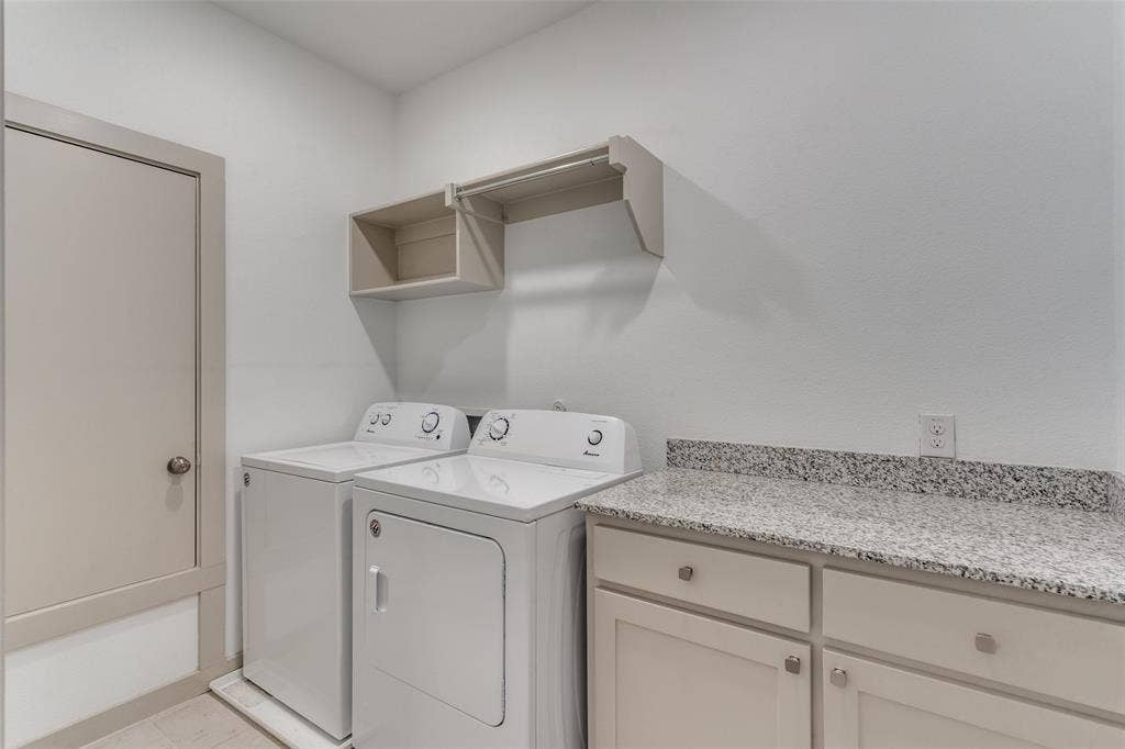 1423 Lamb Drive, Plano, TX 75075 Full size laundry and cabinets, folding counter