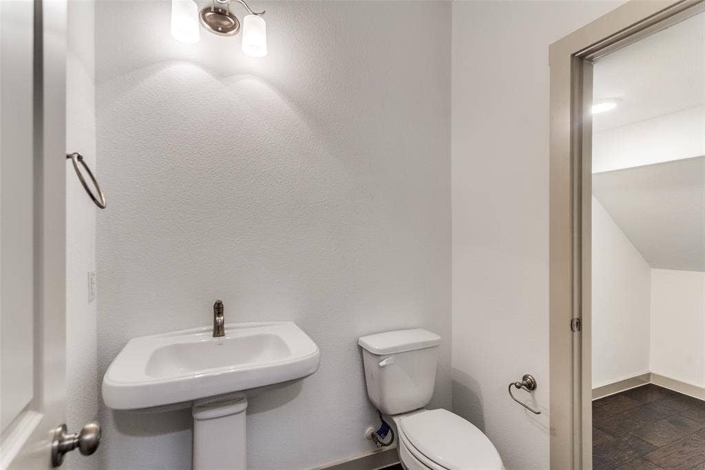 1423 Lamb Drive, Plano, TX 75075 Guest powder down with a handy walk in storage, great for luggage too