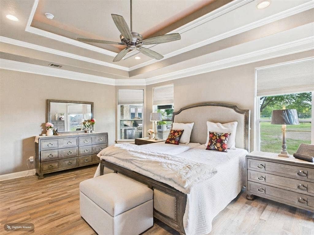 1201 E Iberian Court, Granbury, TX 76048 Tray ceiling with crown molding, wood-finish flooring, recessed lighting, and a ceiling fan