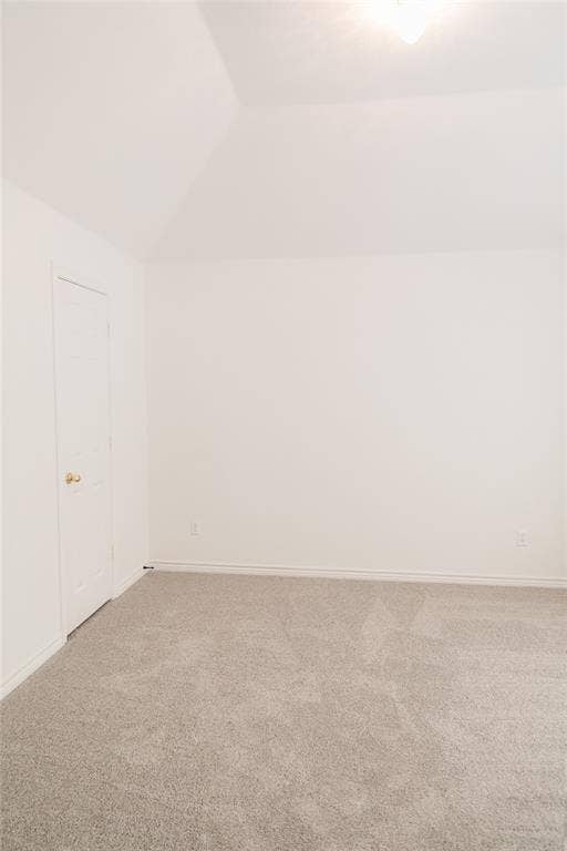 404 Belmont Court, Lewisville, TX 75067 Vaulted ceiling, neutral wall finish, and wall-to-wall carpeting