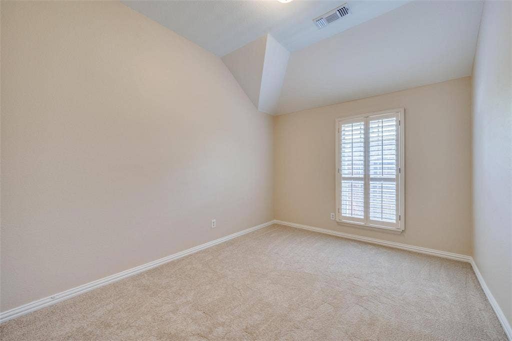 1441 Kirkwood Lane, Prosper, TX 75078 Vaulted ceiling featuring carpeted flooring and interior shutter window treatments