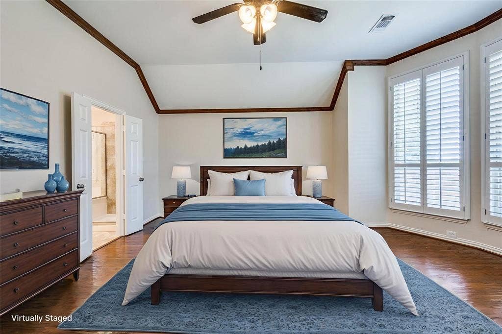 1441 Kirkwood Lane, Prosper, TX 75078 Vaulted ceiling featuring wood-finish crown molding, plantation shutters, and a ceiling fan with integrated lighting