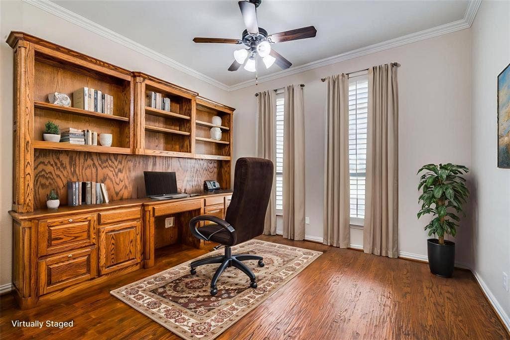 1441 Kirkwood Lane, Prosper, TX 75078 Custom built-in wood cabinetry with integrated desk space and open shelving, wood-finish flooring, crown molding, and plantation shutters