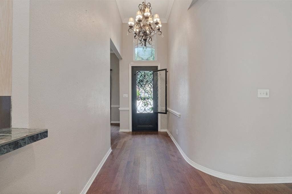 Solid wood with Iron accent door & iron chandelier