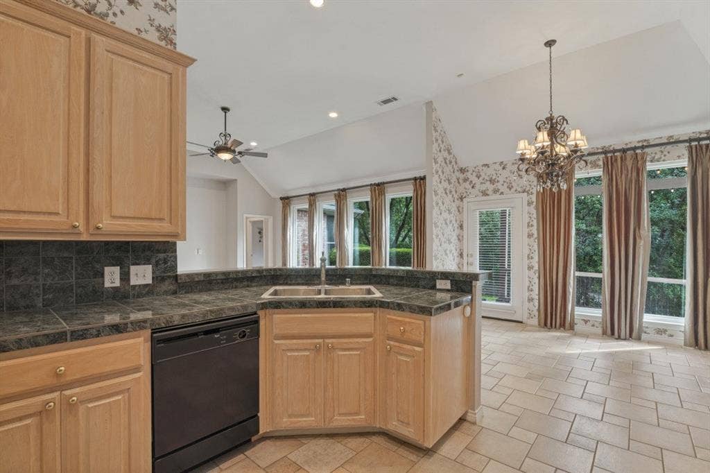ceramic tile countertops view to bkfst area & living rm