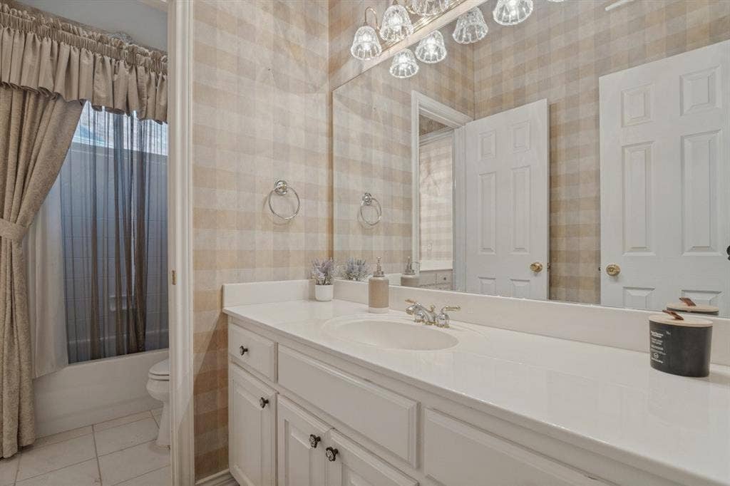 spare bathroom with split vanity design