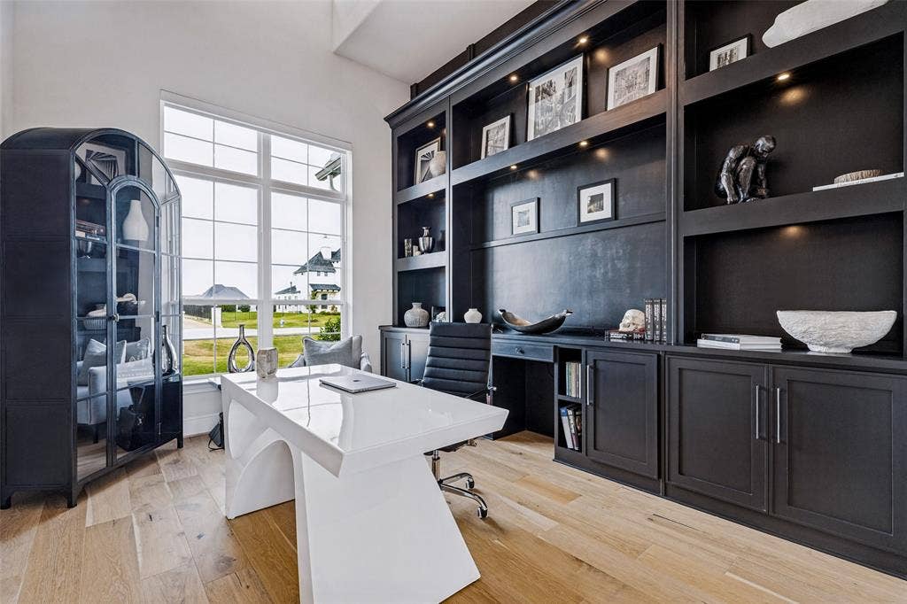 4604 Devon Drive, Parker, TX 75002 Floor-to-ceiling custom cabinetry with integrated display lighting, wood-finish flooring, and expansive grid-patterned windows