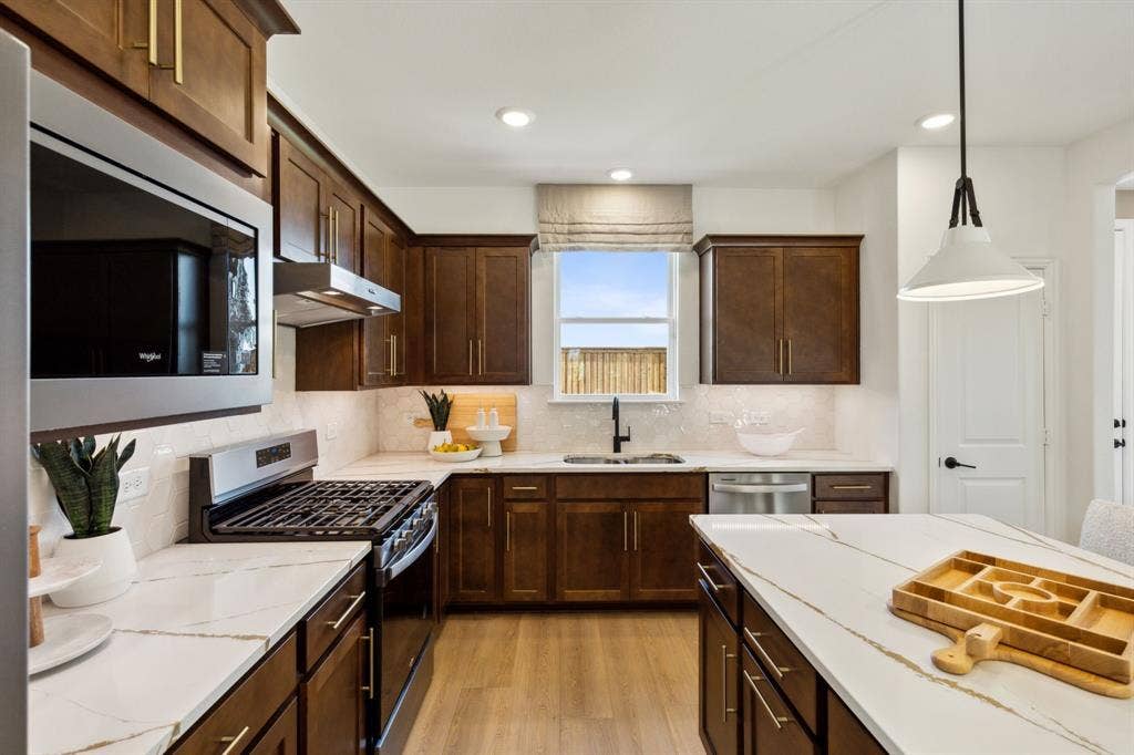 304 Snowbird Way, McKinney, TX 75071 *Model Representation - Abundant cabinet space in kitchen