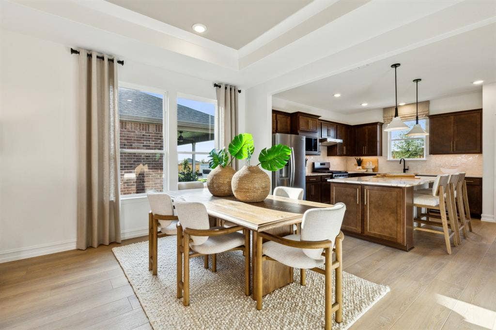 304 Snowbird Way, McKinney, TX 75071 *Model Representation - Dining area off kitchen with large windows