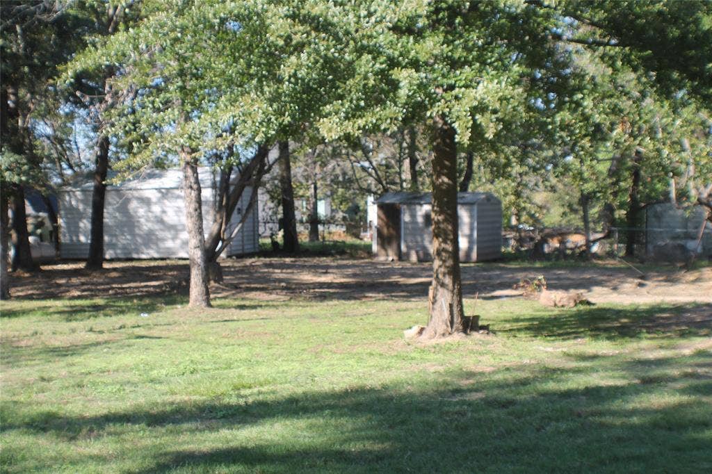 111 Daniel Drive, Mabank, TX 75156 Half acre with storage sheds