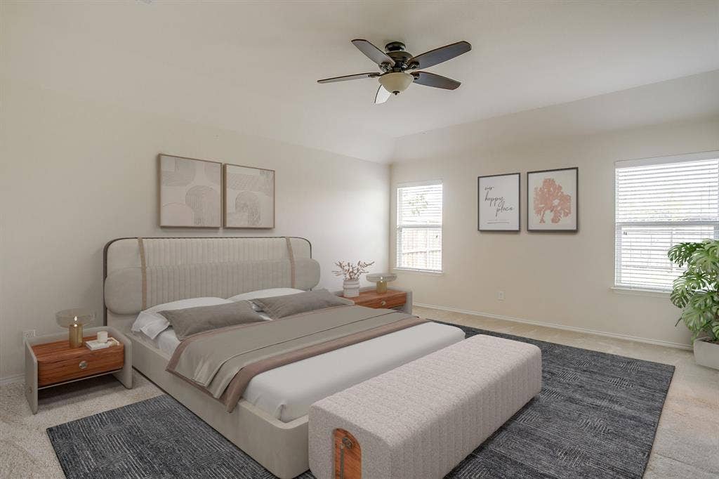 Tray ceiling featuring a central five-blade ceiling fan with integrated light fixture, neutral wall color, and multiple windows with horizontal blinds