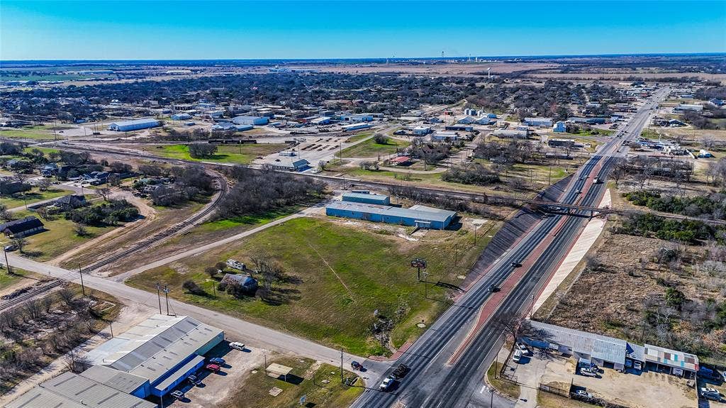 110 1st Street, McGregor, TX 76657 Expansive parcel of land featuring frontage on a primary thoroughfare and proximity to local rail lines