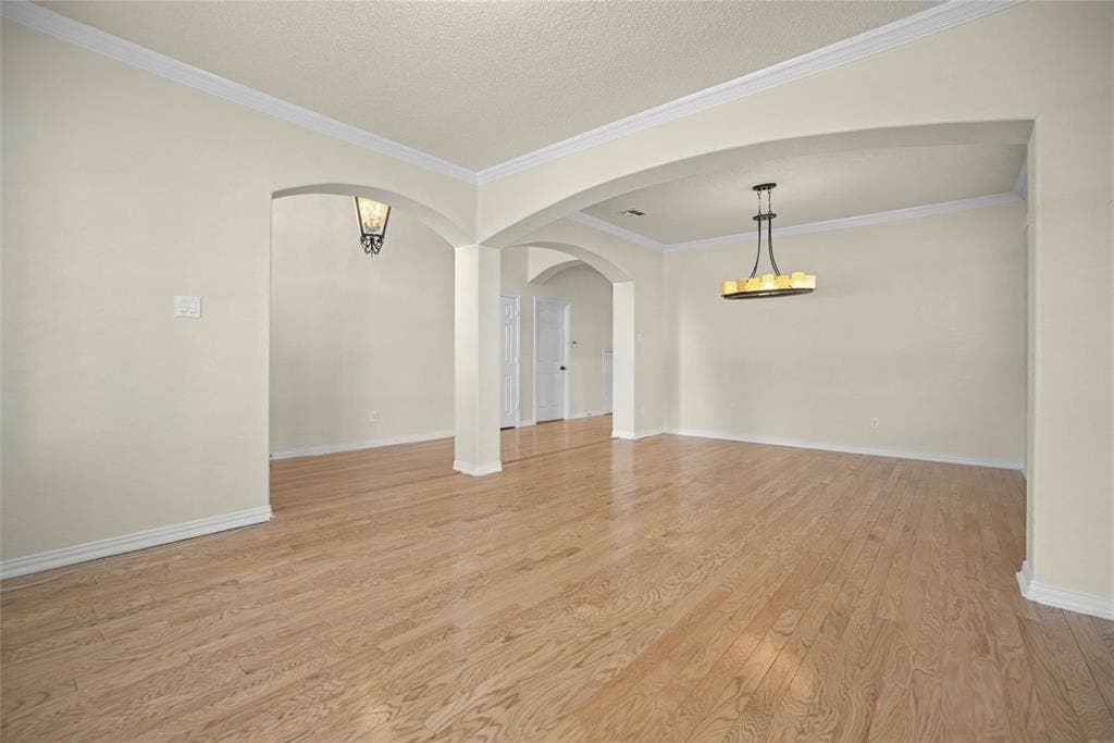 Front living and dining areas finished with hardwoods, lux lighting open, yet private for gatherings.