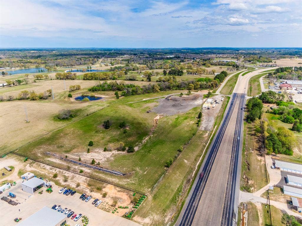 317 Fm 1616, Athens, TX 75752 Expansive acreage featuring rolling topography, open grassy meadows, and direct frontage to a major thoroughfare