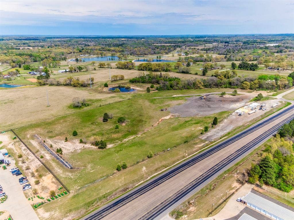 317 Fm 1616, Athens, TX 75752 Expansive acreage featuring rolling topography, open pastureland, scattered mature trees, and multiple natural water features