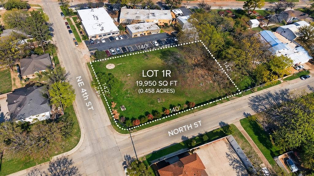 310 4th Street, Grand Prairie, TX 75050 Vacant 19,950 square foot corner lot featuring 140 feet of frontage on North Street and 142 feet of frontage on NE 4th Street