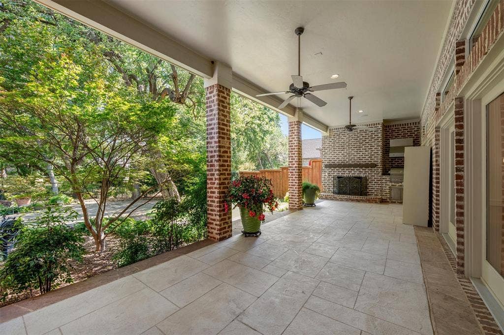 Expansive covered veranda that has fireplace and cooking center. Enjoy the view!
