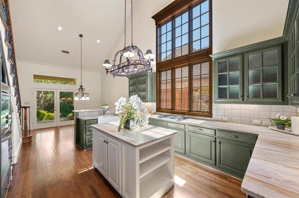 Functional kitchen that has exceptionally high ceilings!  Cosmetic changes made and appliances replaced during this seller's ownership.